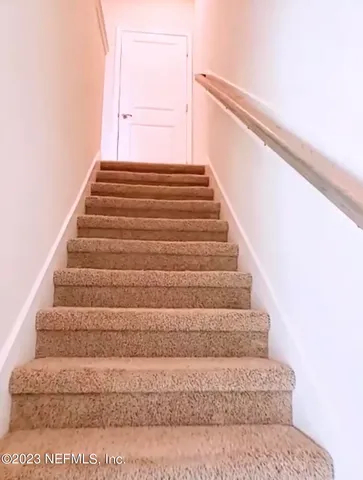 a view of entryway with stairs