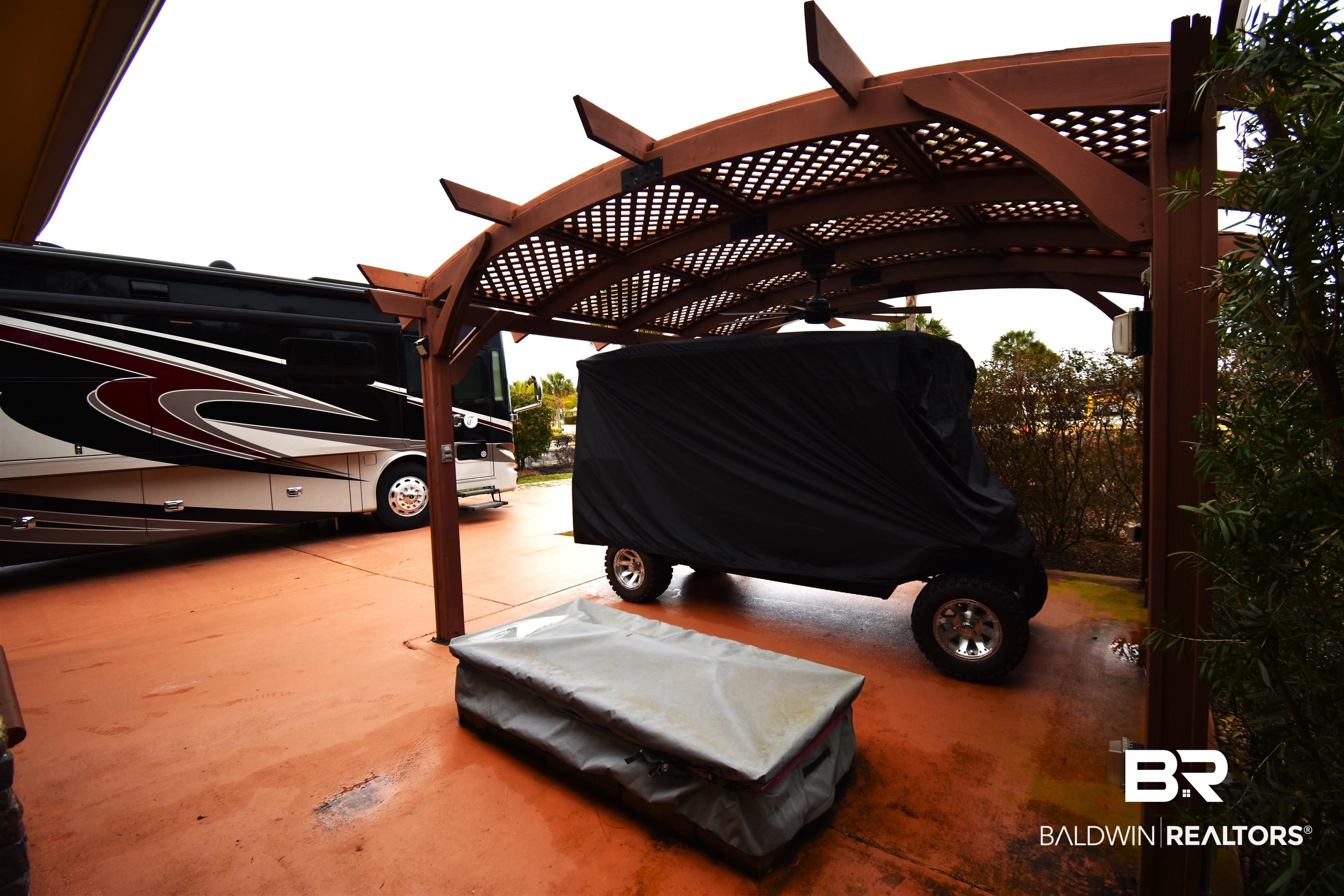 484 Portofino Loop Foley, AL 36535 - Photo 4 of 33 Fire pit/Golfcart parking