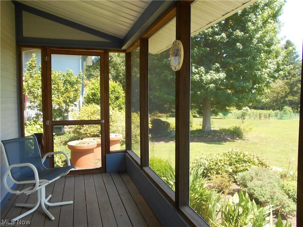 287 Holdren Road Little Hocking, OH 45742 - Photo 21 of 35 Private screened-in porch off of the 1st floor master bedroom