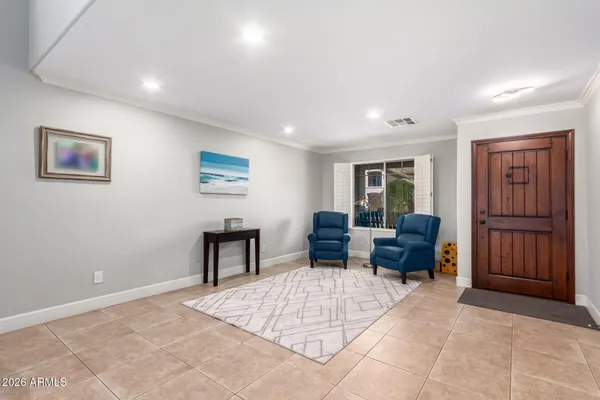 a living room with furniture and a area