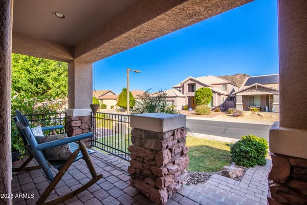 a view of swimming pool with a patio