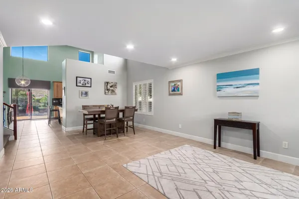 a lobby with furniture and window