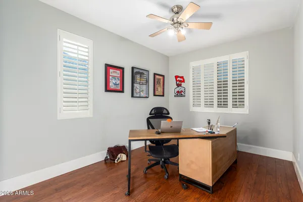a room with furniture and wooden floor