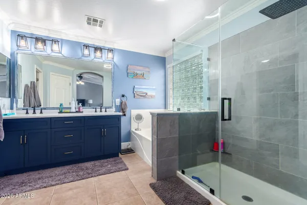 a bathroom with a sink a vanity and a mirror