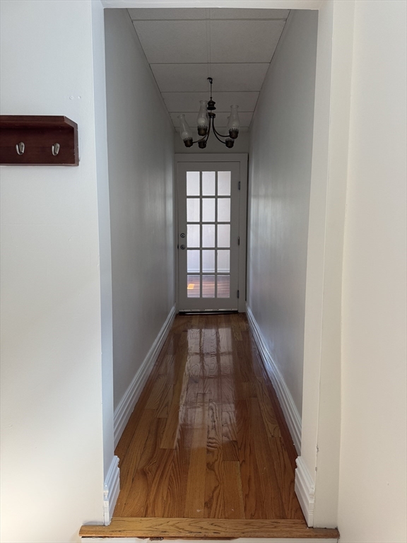 a view of entryway with wooden floor