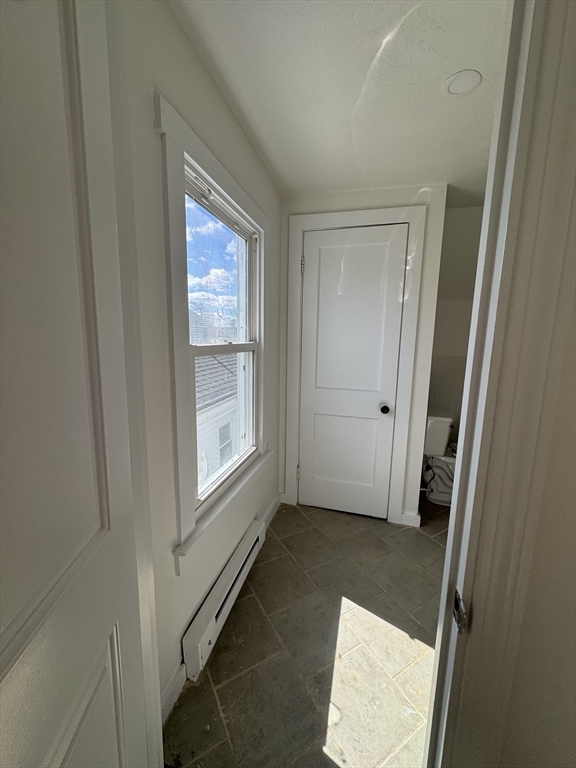 16 Cottage Street, Unit 2 Lynn, MA 01905 - Photo 14 of 25 a view of an empty room and window