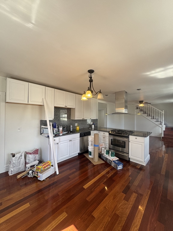 16 Cottage Street, Unit 2 Lynn, MA 01905 - Photo 2 of 25 a kitchen with a sink and a stove top oven