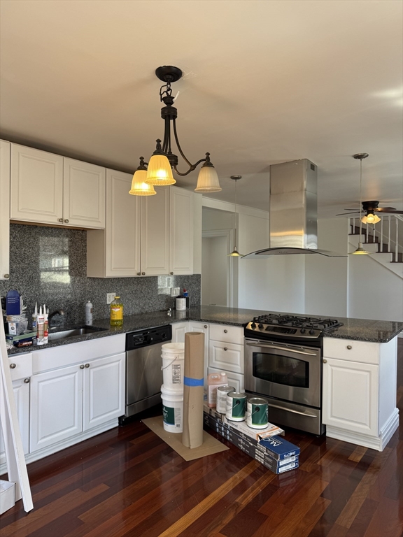 16 Cottage Street, Unit 2 Lynn, MA 01905 - Photo 3 of 25 a kitchen with a sink cabinets and wooden floor