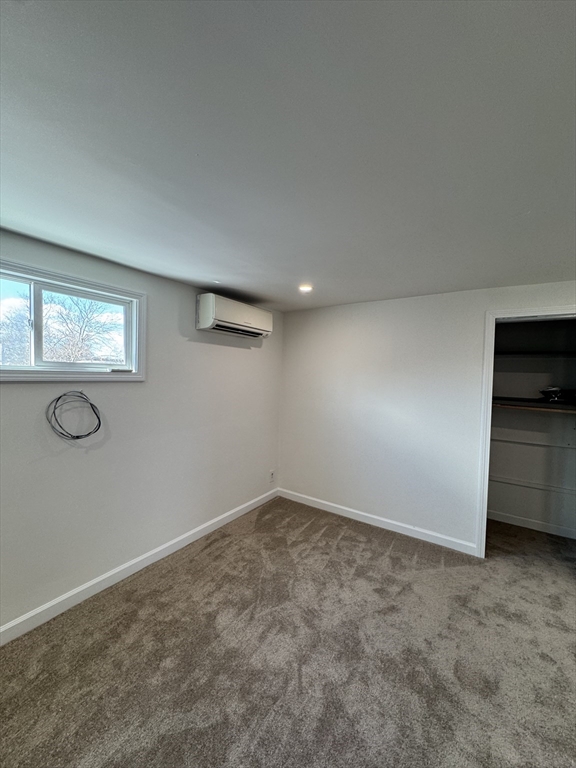 16 Cottage Street, Unit 2 Lynn, MA 01905 - Photo 5 of 25 an empty room with windows