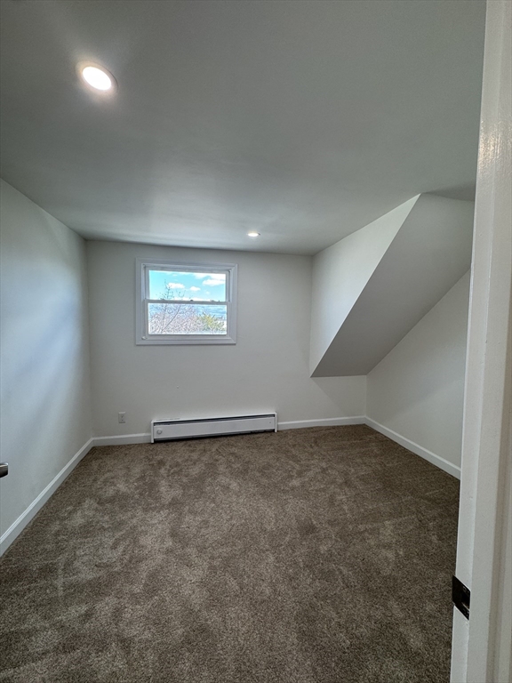 16 Cottage Street, Unit 2 Lynn, MA 01905 - Photo 8 of 25 an empty room with a empty space and window
