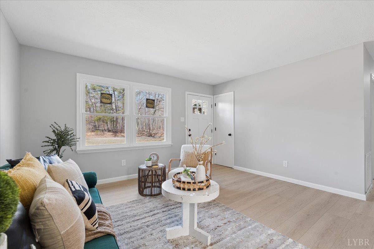 146 Watts Mill Road Pamplin, VA 23958 - Photo 15 of 37 a living room with furniture and window