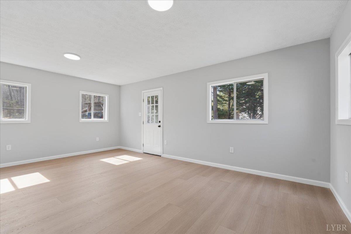 146 Watts Mill Road Pamplin, VA 23958 - Photo 17 of 37 a view of an empty room with a window
