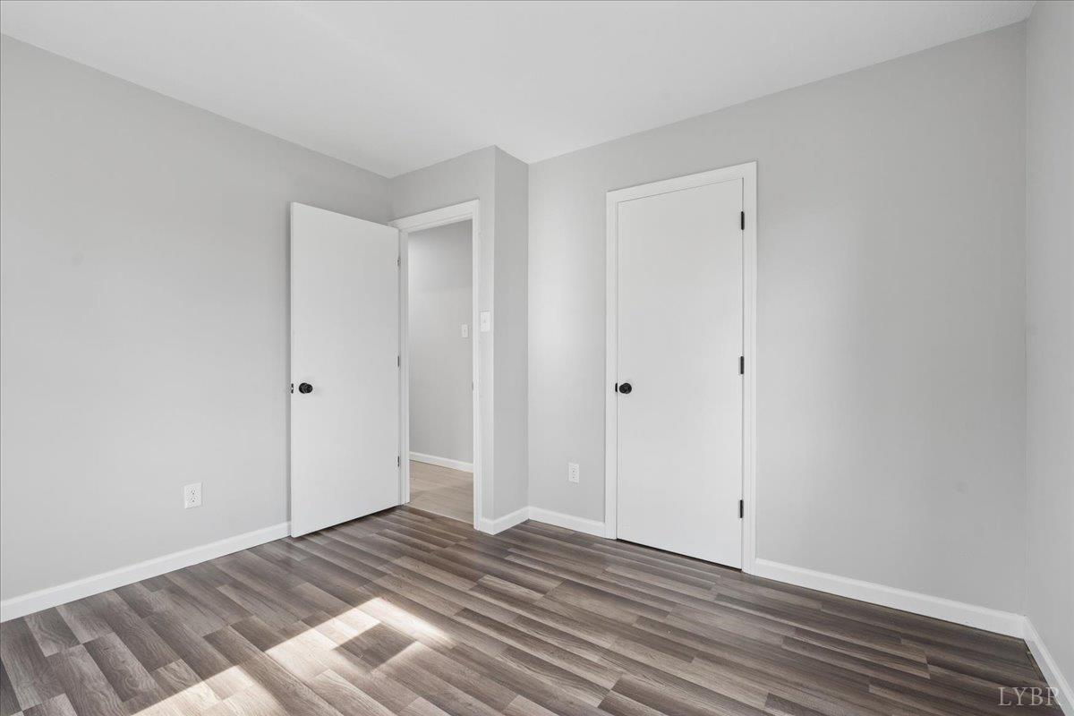 146 Watts Mill Road Pamplin, VA 23958 - Photo 22 of 37 a view of a room with wooden floor