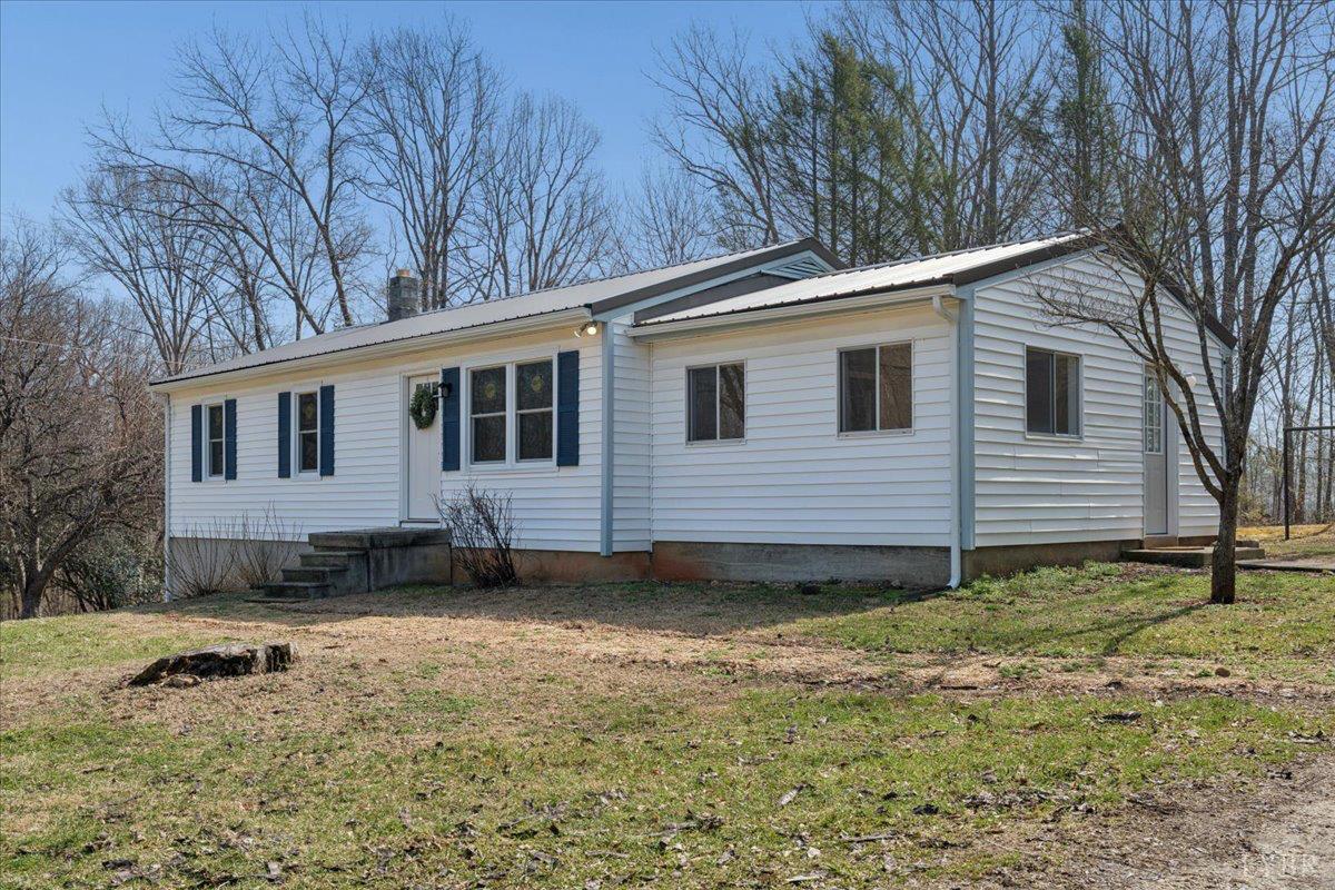 146 Watts Mill Road Pamplin, VA 23958 - Photo 26 of 37 a view of a house with a yard