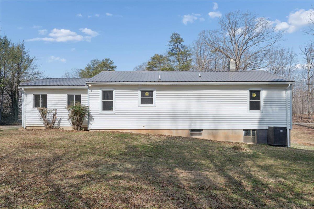 146 Watts Mill Road Pamplin, VA 23958 - Photo 28 of 37 a view of a house with a yard
