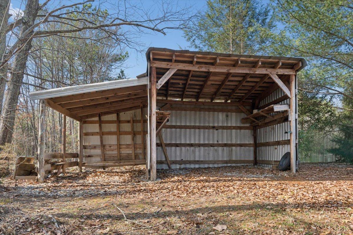 146 Watts Mill Road Pamplin, VA 23958 - Photo 30 of 37 a view of a house with a wooden fence
