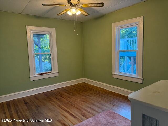 1034 Fairfield Street, Unit 1 Scranton, PA 18509 - Photo 5 of 6 a view of an empty room with wooden floor and a window