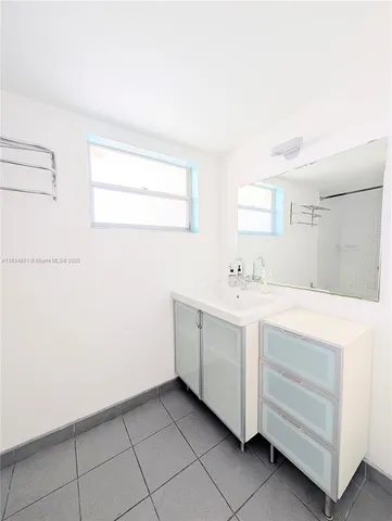 a view with cabinets and window