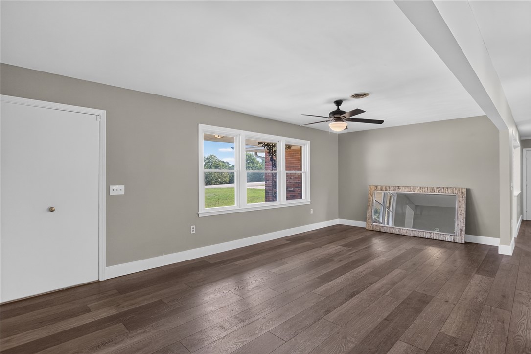 Rich wood floors lay a beautiful foundation beneath clean lines and generous natural lighting.