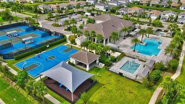 an aerial view of a house with a garden