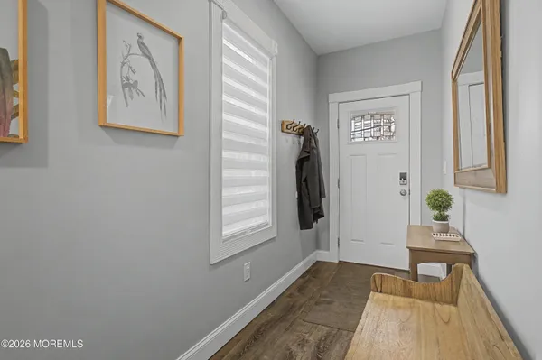 a bedroom with a bed and cabinets