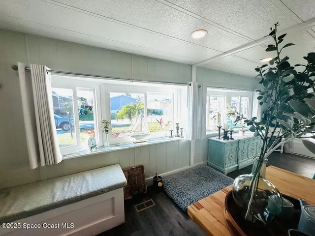 a room with furniture and a window