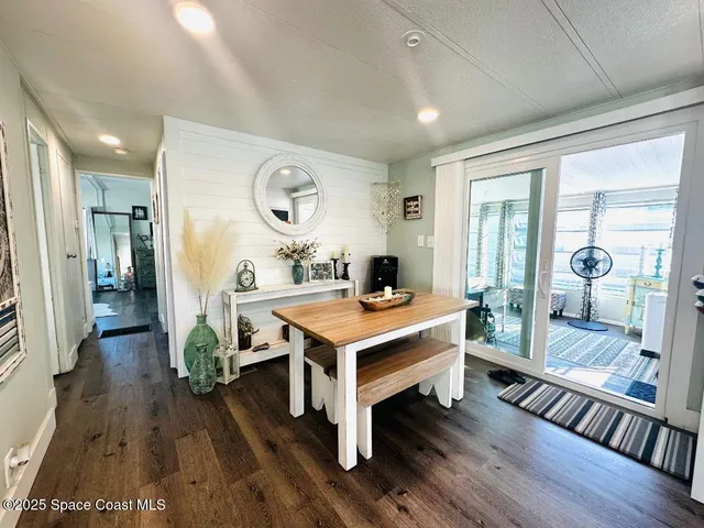 a room with furniture and wooden floor
