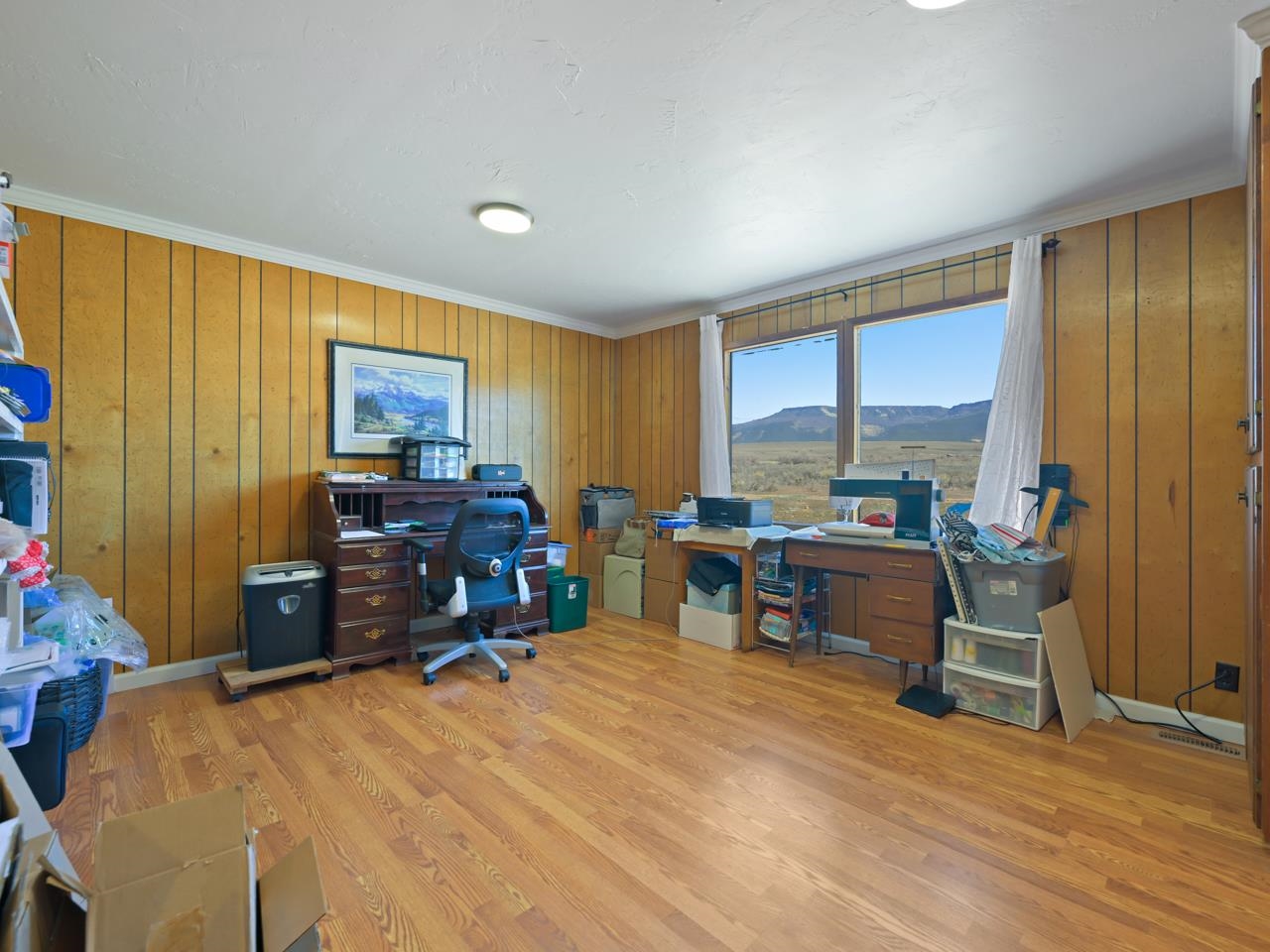 6777 Reeder Mesa Road Whitewater, CO 81527 - Photo 12 of 42 a bed room with a bed and furniture