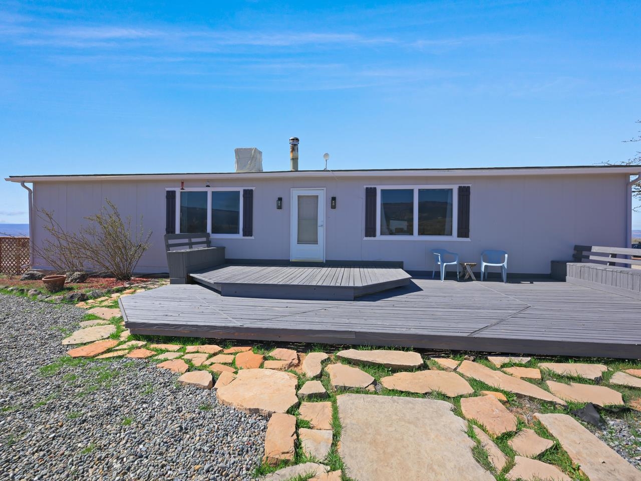 6777 Reeder Mesa Road Whitewater, CO 81527 - Photo 2 of 42 a front view of house with yard