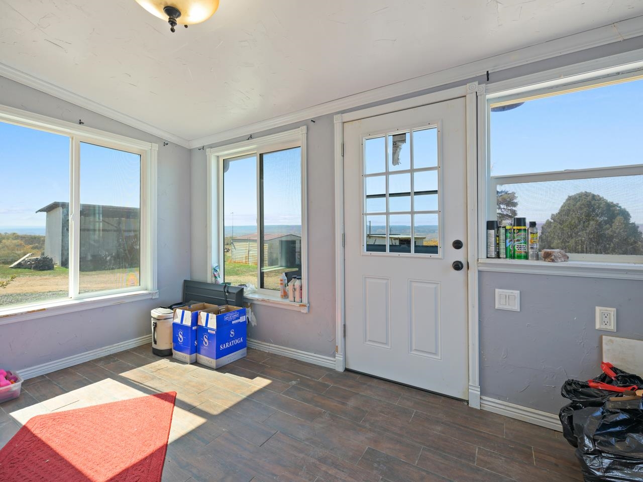6777 Reeder Mesa Road Whitewater, CO 81527 - Photo 21 of 42 a living room with furniture and a window