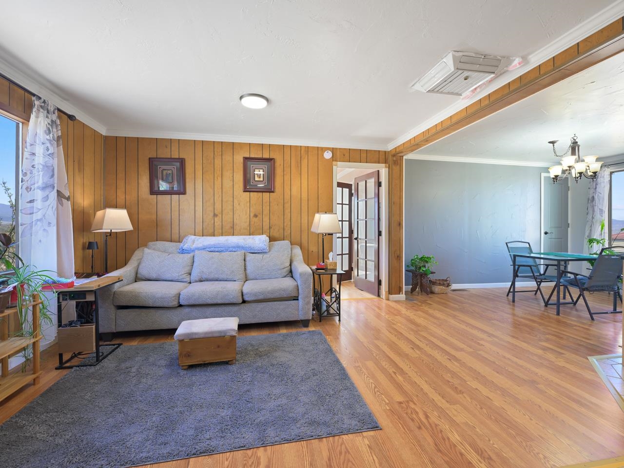 6777 Reeder Mesa Road Whitewater, CO 81527 - Photo 3 of 42 a living room with furniture and a dining table
