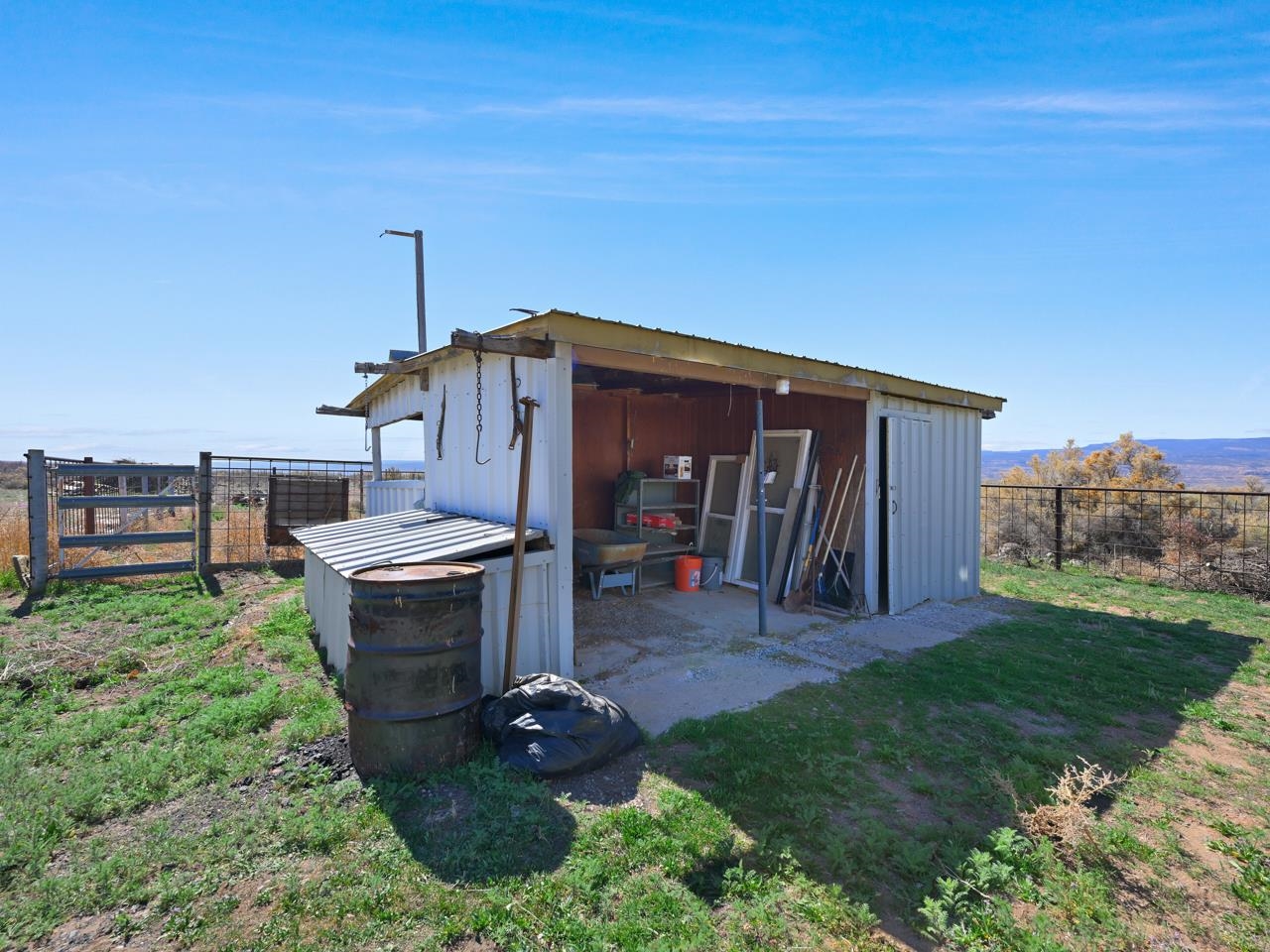 6777 Reeder Mesa Road Whitewater, CO 81527 - Photo 33 of 42 a view of a house with backyard