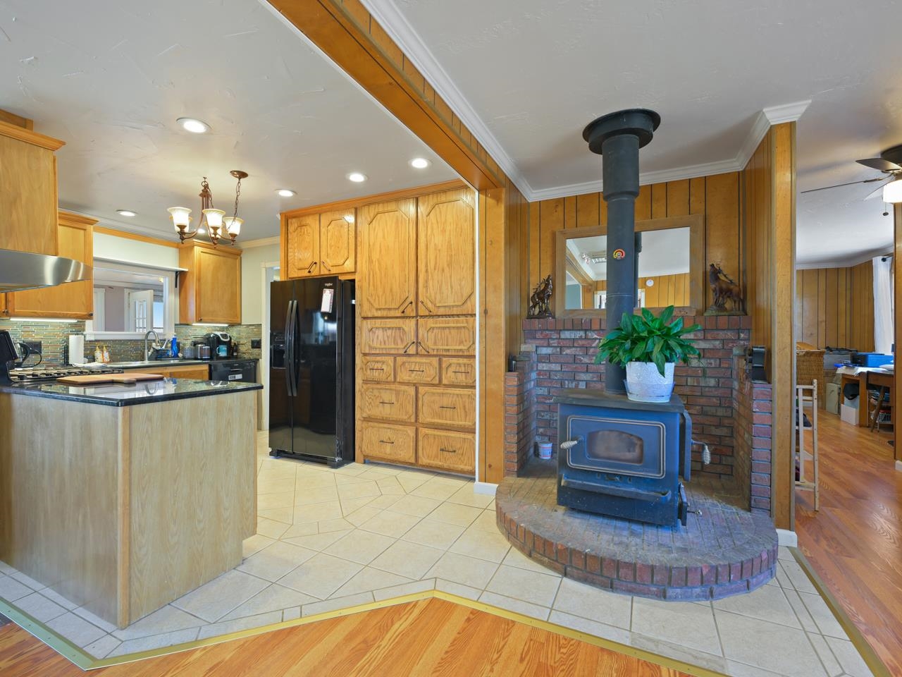 6777 Reeder Mesa Road Whitewater, CO 81527 - Photo 6 of 42 a living room with stainless steel appliances kitchen island granite countertop furniture and a view of living room