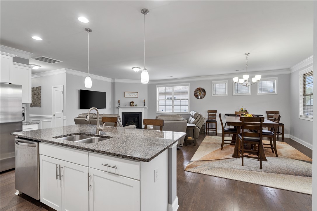 120 Rossmoor Court Anderson, SC 29621 - Photo 12 of 32 Bright open-concept living with elegant finishes and ample space for everyday living and entertaining.