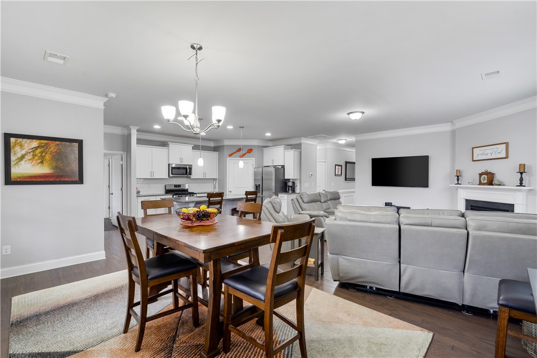 120 Rossmoor Court Anderson, SC 29621 - Photo 14 of 32 This inviting space combines open-concept living with elegant finishes for comfortable gatherings.