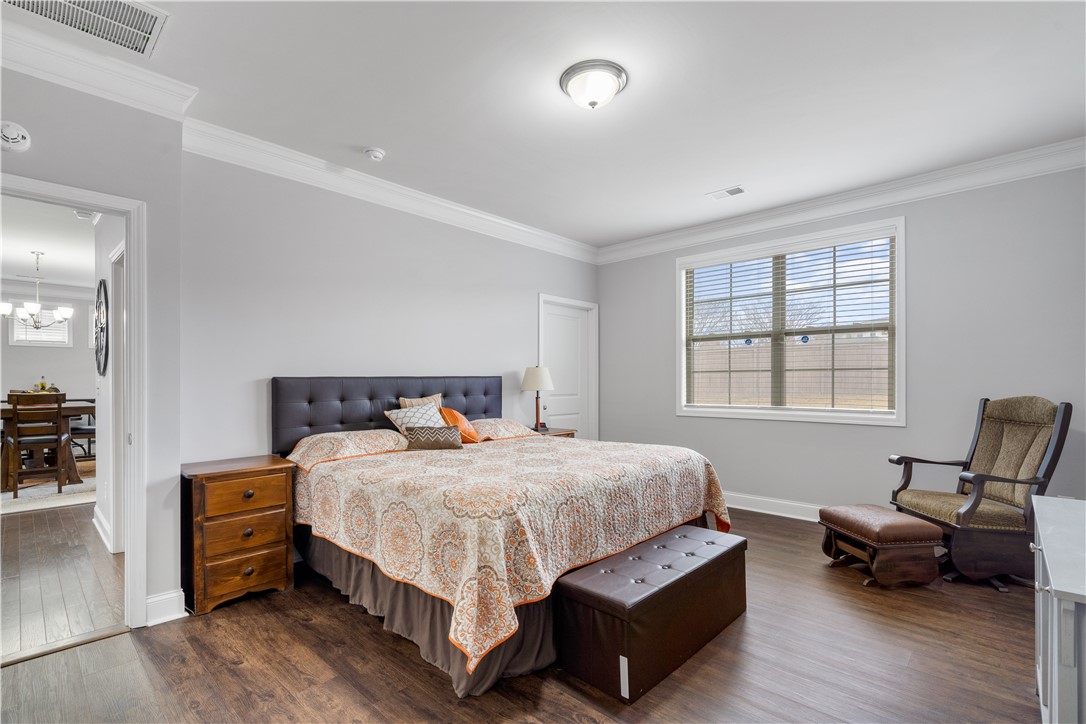 120 Rossmoor Court Anderson, SC 29621 - Photo 15 of 32 This spacious bedroom offers serene comfort and abundant natural light.