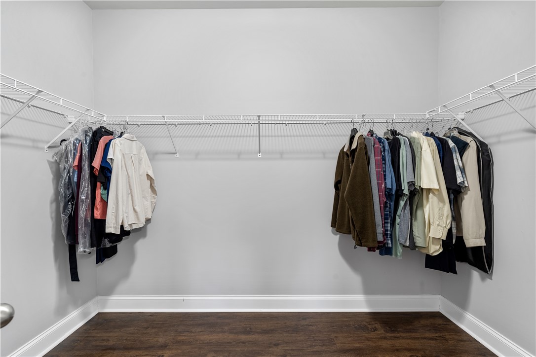 120 Rossmoor Court Anderson, SC 29621 - Photo 20 of 32 This spacious walk-in closet features ample storage with wire shelving and rich hardwood flooring.