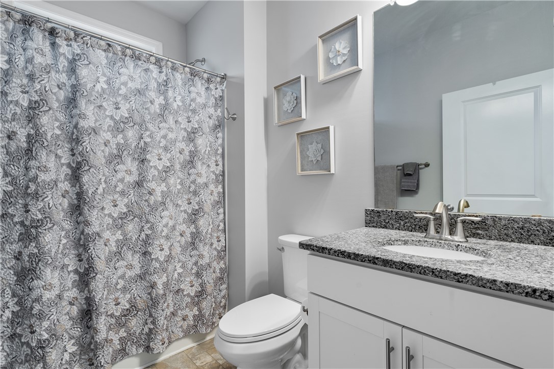 120 Rossmoor Court Anderson, SC 29621 - Photo 22 of 32 This bathroom features a contemporary vanity with a granite counter, offering both style and utility.