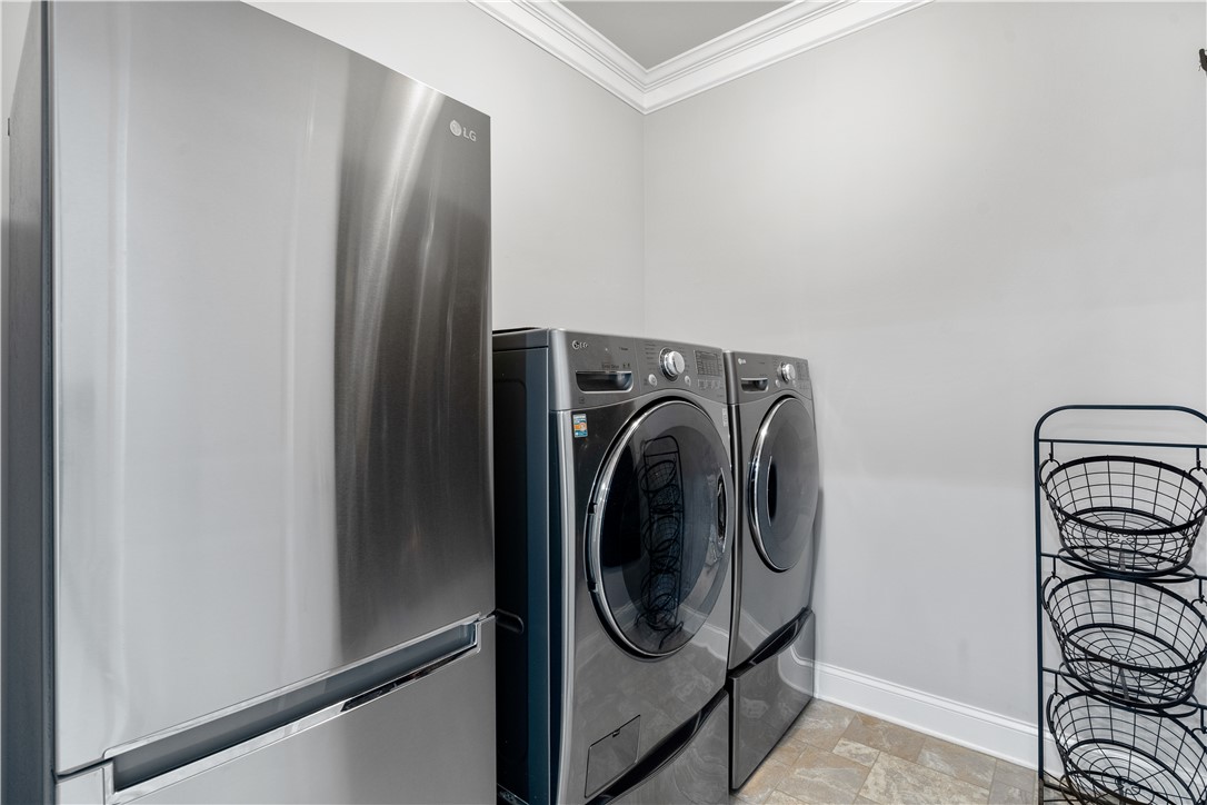120 Rossmoor Court Anderson, SC 29621 - Photo 24 of 32 This dedicated laundry space combines functionality with sleek, modern appliances.