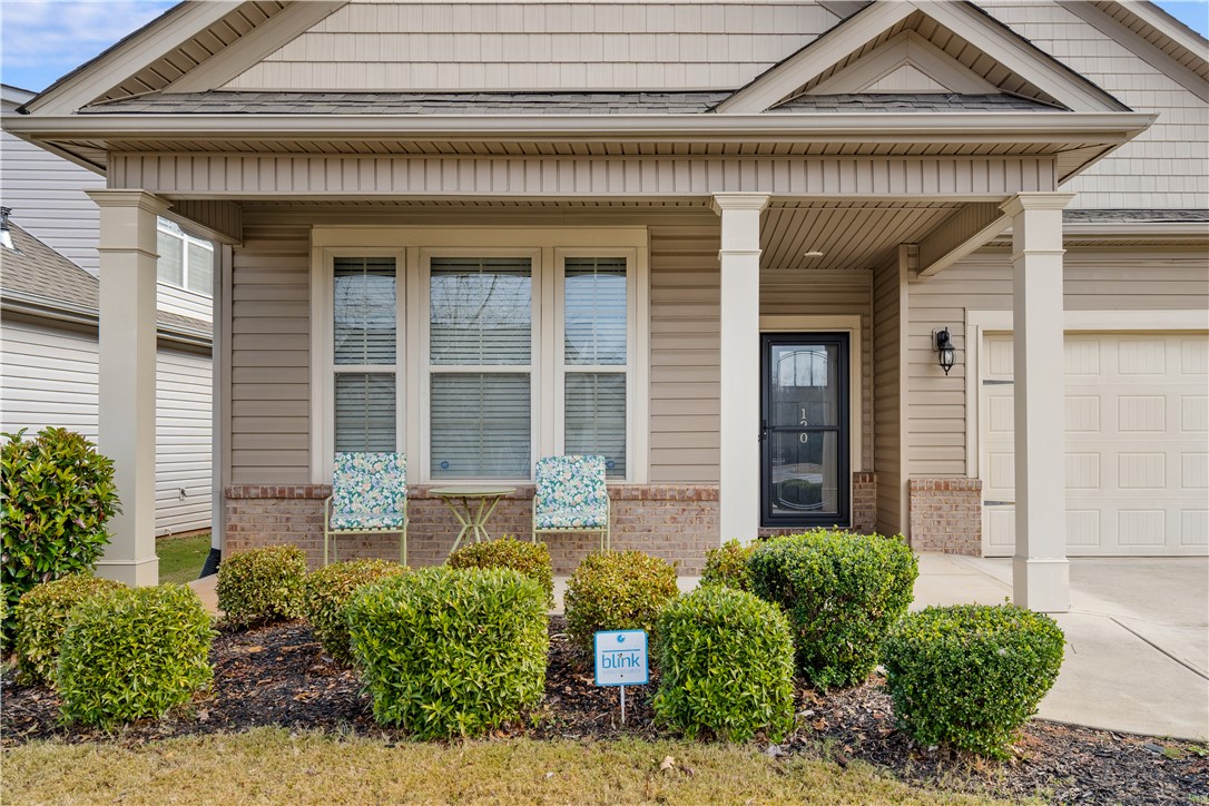 120 Rossmoor Court Anderson, SC 29621 - Photo 3 of 32 This charming home welcomes you with a classic facade, manicured landscaping, and a welcoming front porch.
