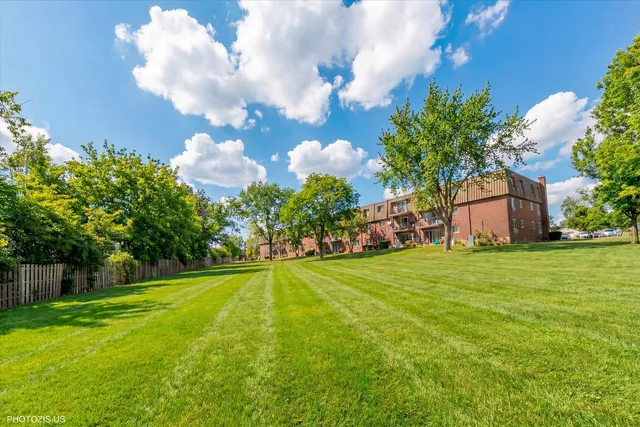 a backyard of a house with lots of green space