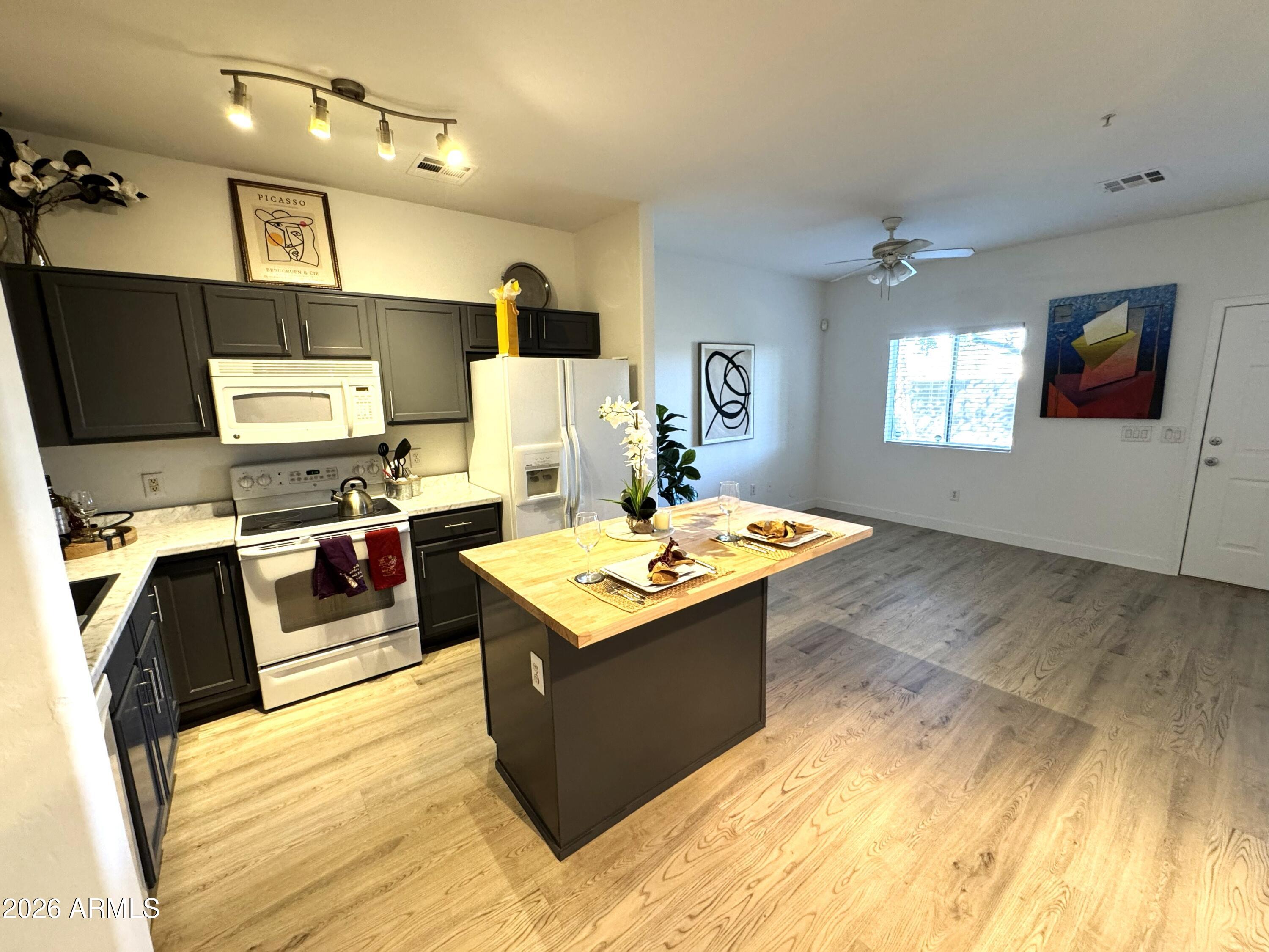 1718 West Colter Street, Unit 110 Phoenix, AZ 85015 - Photo 3 of 43 IMG_7574