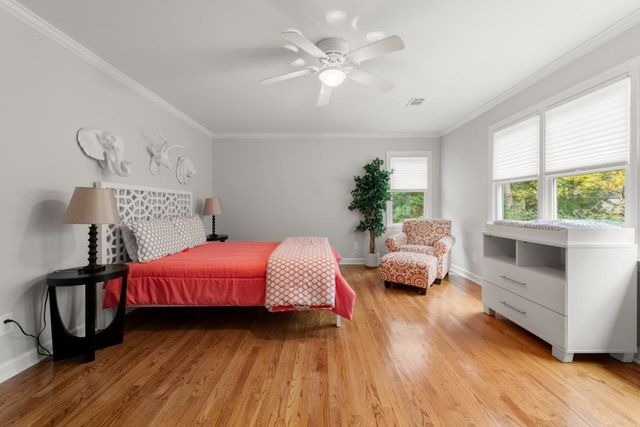 an aerial view of a house with yard swimming pool and outdoor seating