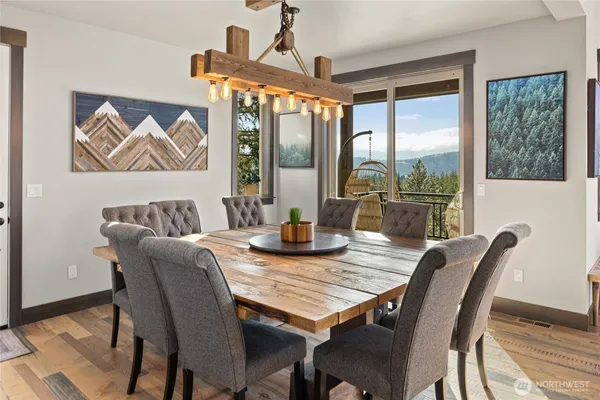 a large bed sitting in a bedroom next to a window
