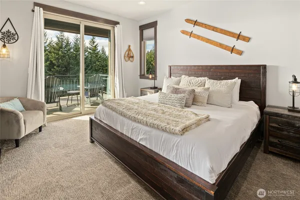 a bathroom with double vanity sinks and a mirror