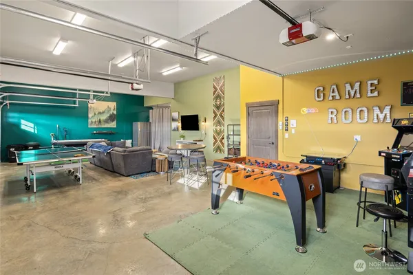 a utility room with sink dryer and washer