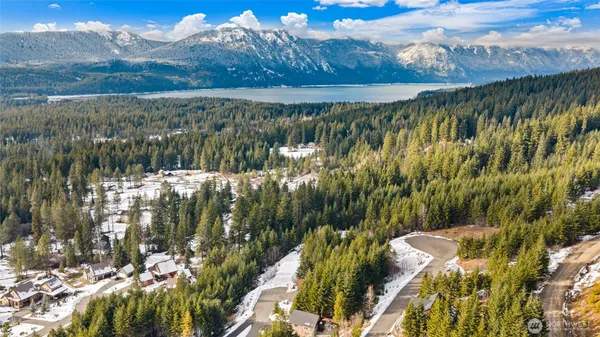 a front view of a house with table and chairs
