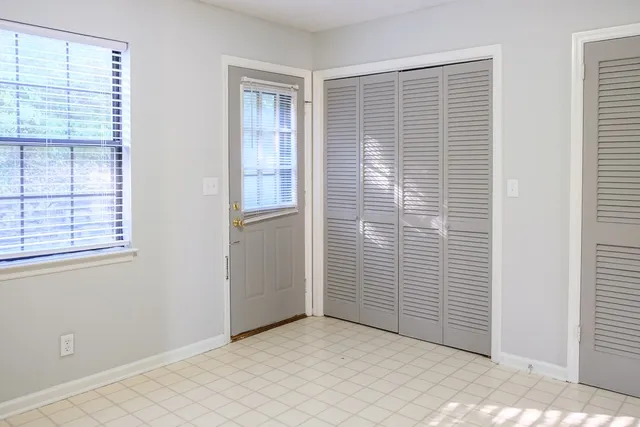 an empty room with windows