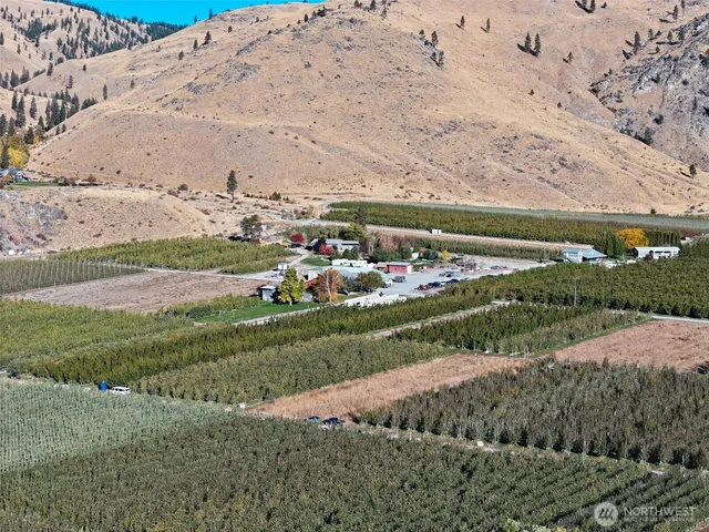 a view of a town with mountains in the background