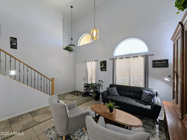 a kitchen with kitchen island a large counter top space appliances and cabinets
